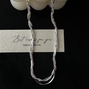 Collier élégant multi-rangs en argent sterling S925 avec design en spirale entrelacée