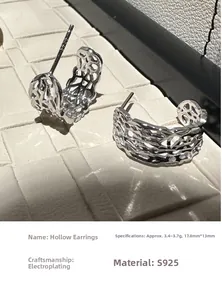 Macro detail of S925 sterling silver hollow woven earrings with CNC cut texture