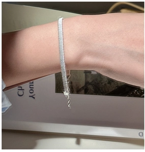 Close-up of S925 sterling silver woven chain bracelet with adjustable lobster clasp