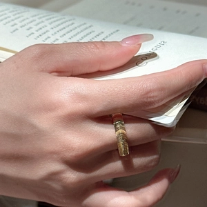 S925 sterling silver gold cat eye ring with brushed texture on model finger