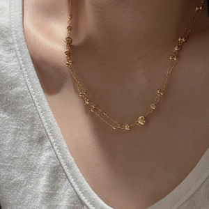 S925 sterling silver layered necklace featuring golden cat-eye beads on a dainty chain