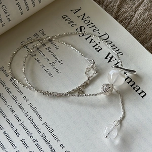 S925 sterling silver snowflake ghost necklace with crystal beads and T-bar clasp on book