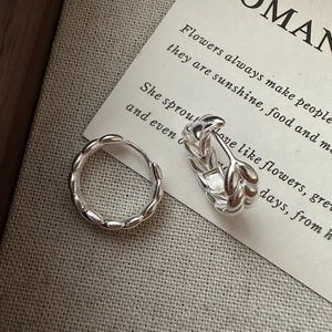 Minimalist S925 sterling silver hoop earrings with wheat ear texture on grey fabric