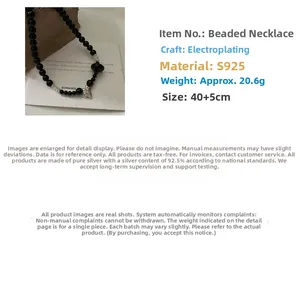 Detail view of S925 silver black onyx heart necklace with plating and sizing parameters