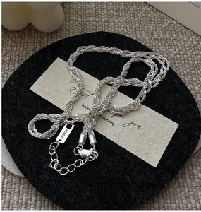 Detail of S925 sterling silver woven twist chain with adjustable lobster clasp closure