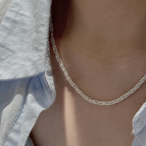 Elegant S925 sterling silver woven snowflake necklace with a minimalist braided chain
