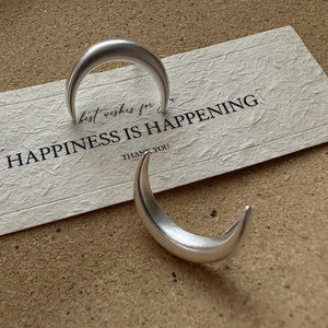 Minimalist S925 sterling silver crescent hoop earrings with matte brushed texture