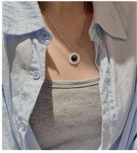 S925 sterling silver necklace featuring a vintage obsidian pendant with textured details