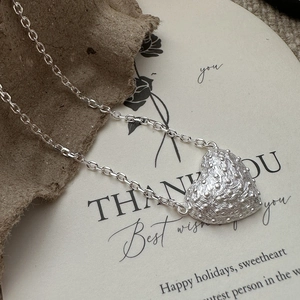 925 silver heart necklace with vintage embossed texture on elegant gift card