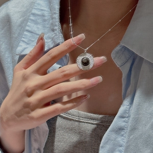 S925 sterling silver necklace featuring hammered texture pendant with black obsidian stone