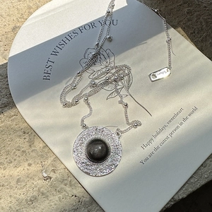 S925 sterling silver necklace with a round obsidian pendant and fine beaded chain