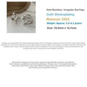 Detailed view of S925 sterling silver U-shaped hoop earrings with layered curves