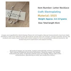 Detailed view of S925 silver LUCKY necklace with sparkling zircon-studded letter pendants