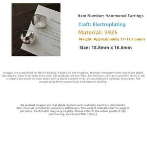 Detailed view of S925 sterling silver hammered rhombus earrings with electroplated finish