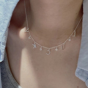 Minimalist S925 silver LUCKY letter necklace with small stones on a fine chain