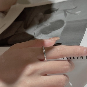Minimalist S925 sterling silver ring with double-sided rectangular zircon stones on hand