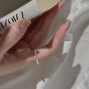 S925 sterling silver minimalist geometric cut ring on hand with lifestyle background