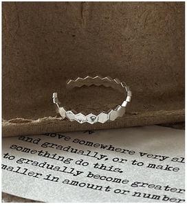 Detail of S925 silver open ring featuring a unique hexagonal honeycomb texture design