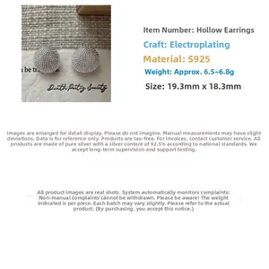 Macro shot of S925 sterling silver hollow ball earrings with textured mesh grain surface