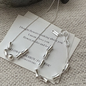 Minimalist S925 sterling silver bamboo joint necklace with polished silver bead detail