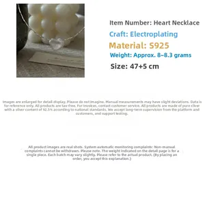 Detailed view of S925 sterling silver heart necklace with brushed texture and 47+5cm chain