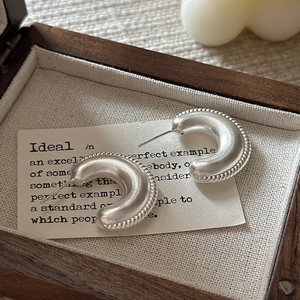 Minimalist S925 sterling silver hoop earrings with a matte frosted finish and vintage texture
