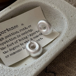 Minimalist S925 sterling silver hollow hoop earrings with a matte textured finish