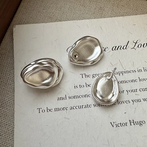 Elegant matte S925 sterling silver teardrop stud earrings with irregular fluid design