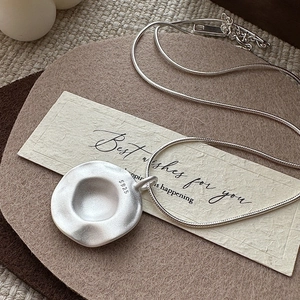 Matte S925 sterling silver necklace with irregular organic disc pendant and snake chain
