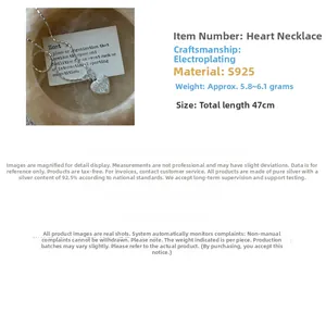 Macro detail of S925 sterling silver heart necklace with 47cm chain length and specifications