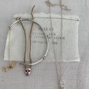S925 sterling silver vintage bracelet and necklace set on white fabric background