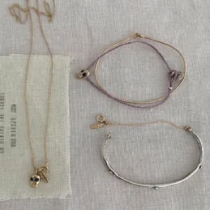 Vintage S925 sterling silver skull jewelry set with gold necklace and textured cuff