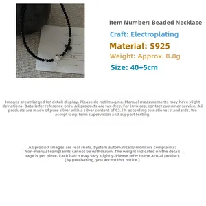 Detail of S925 silver beaded necklace with black onyx beads and T-bar toggle clasp