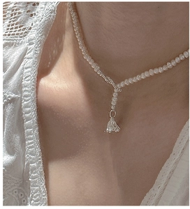 Elegant S925 silver pearl necklace with fringe pendant worn on white lace top