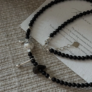 S925 sterling silver necklace with black agate beads and spherical镂空 hollow pendant