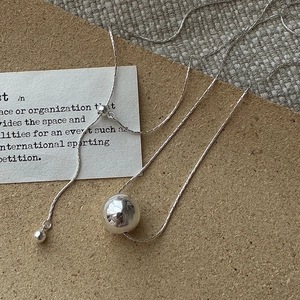 Minimalist S925 silver snake chain necklace with polished metal ball pendant