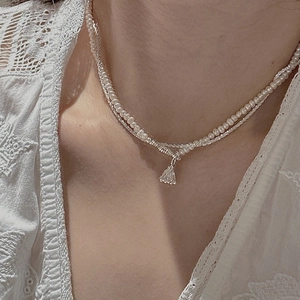 Double-layer S925 sterling silver necklace with white pearls and a delicate silver pendant