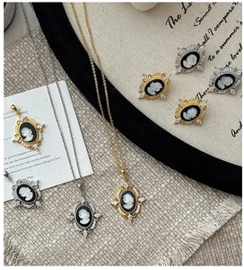 Detailed close-up of retro S925 silver cameo earrings with vintage relief portrait design