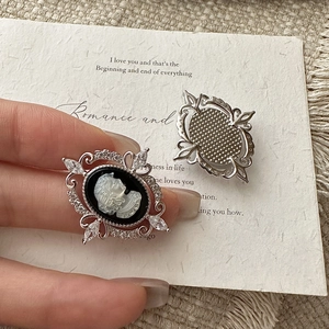 Elegant S925 sterling silver cameo earrings with vintage relief and sparkling zircon stones