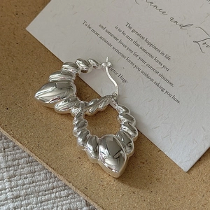 Polished S925 sterling silver twisted croissant hoop earrings with minimalist hollow design