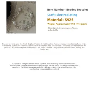 Detail of S925 sterling silver beads and clear quartz crystal elastic bracelet
