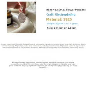 Detailed close-up of a S925 sterling silver daisy pendant with dimensions 21.1mm by 12.6mm