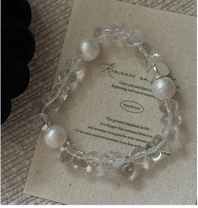 Detailed shot of S925 silver beaded bracelet with clear crystals and matte silver beads