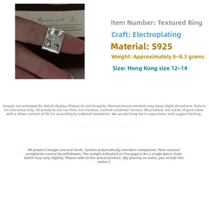 Detailed close-up of S925 sterling silver square ring with unique textured hammered surface