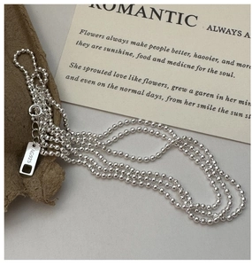 Macro shot of S925 sterling silver beads chain showing the AG925 hallmark tag