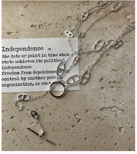 Detail of S925 sterling silver toggle clasp and hallmark on long pig nose necklace