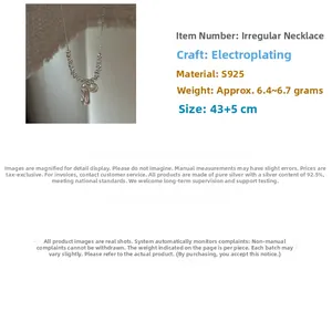 Detail of S925 sterling silver necklace featuring irregular beads and a pearl drop pendant