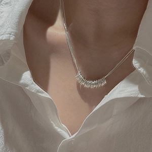 Minimalist S925 sterling silver triple-layer circle pendant necklace on a model