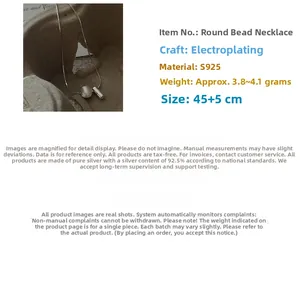 Detailed view of S925 sterling silver ball necklace featuring a brushed finish pendant