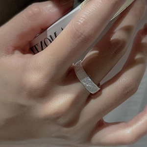 Minimalist S925 sterling silver ring with brushed star pattern and vintage texture on hand
